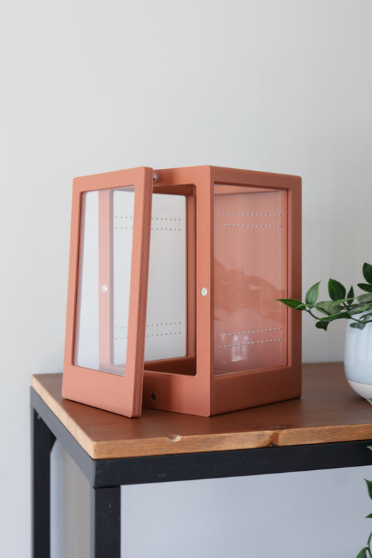 3D-printed jumping spider enclosure in multiple colors